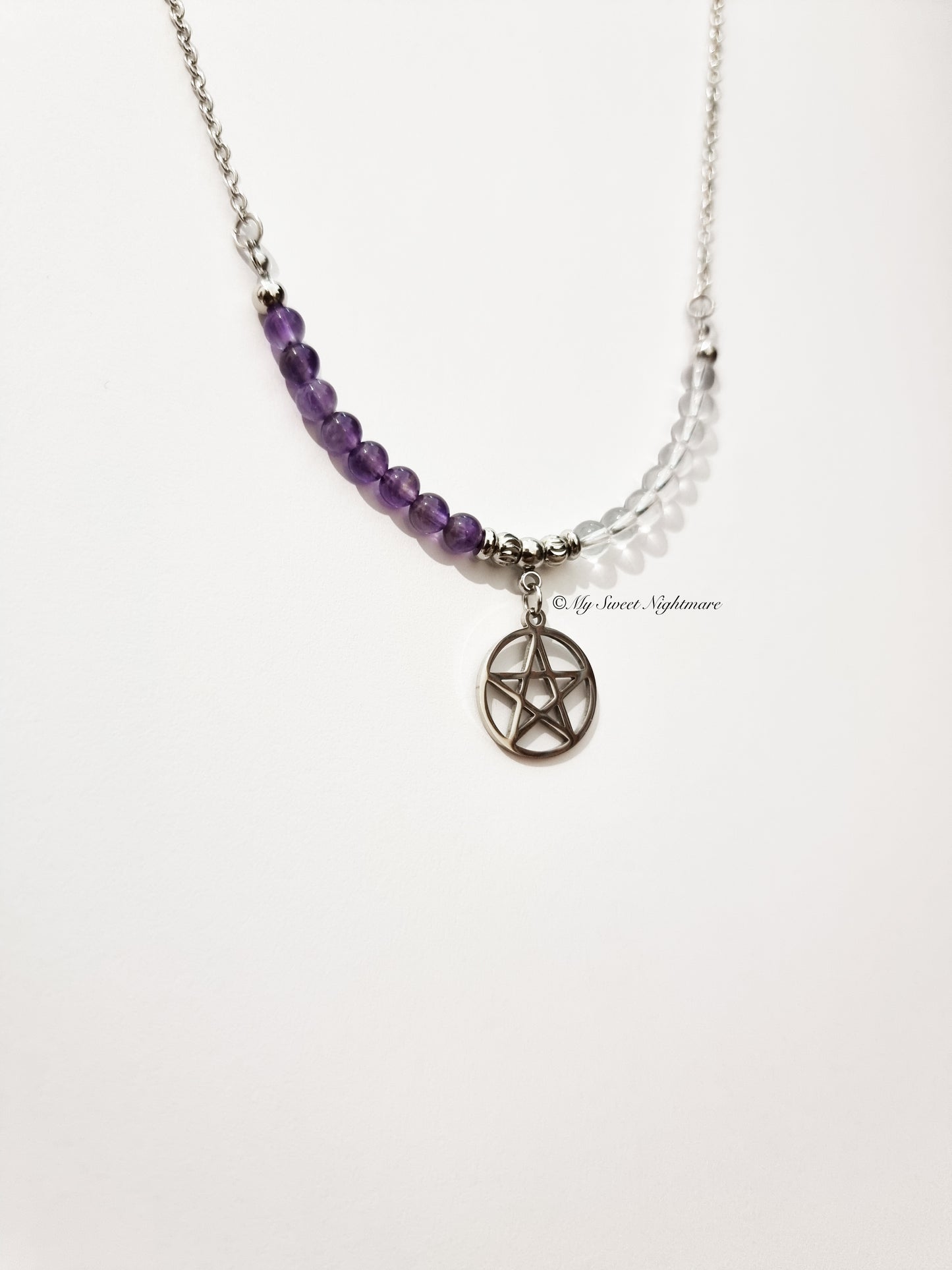 Necklace with pentagram, amethyst and rock crystal