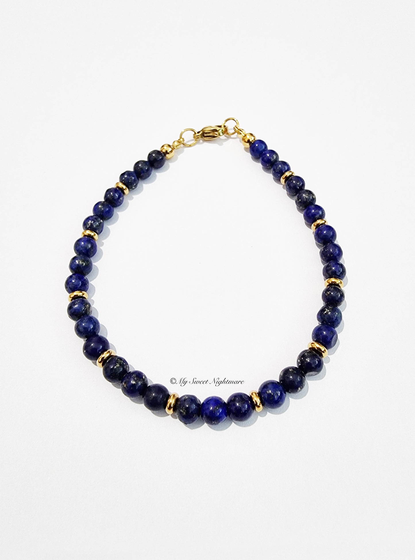 Bracelet in AA quality Lapis Lazuli and gold steel
