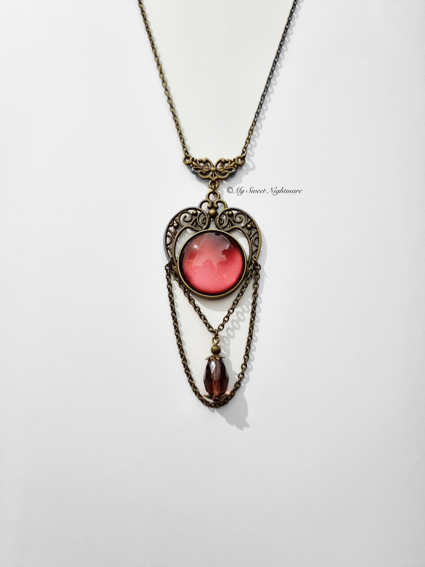 Collana vittoriana in bronzo con pietra rossa in vetro e cristallo