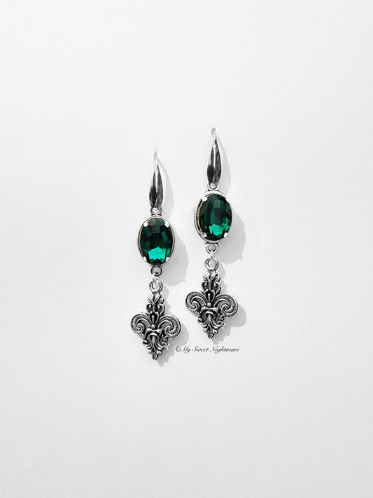 Earrings with lilies and green gems